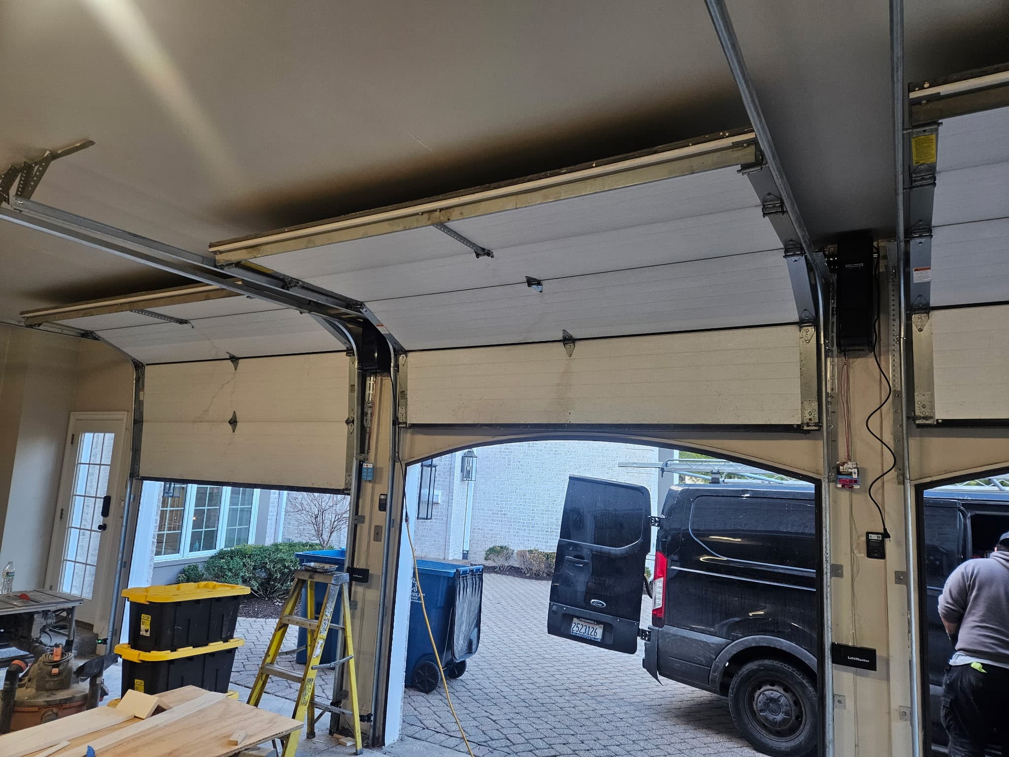 Wood-look insulated door. New construction install, west suburbs
