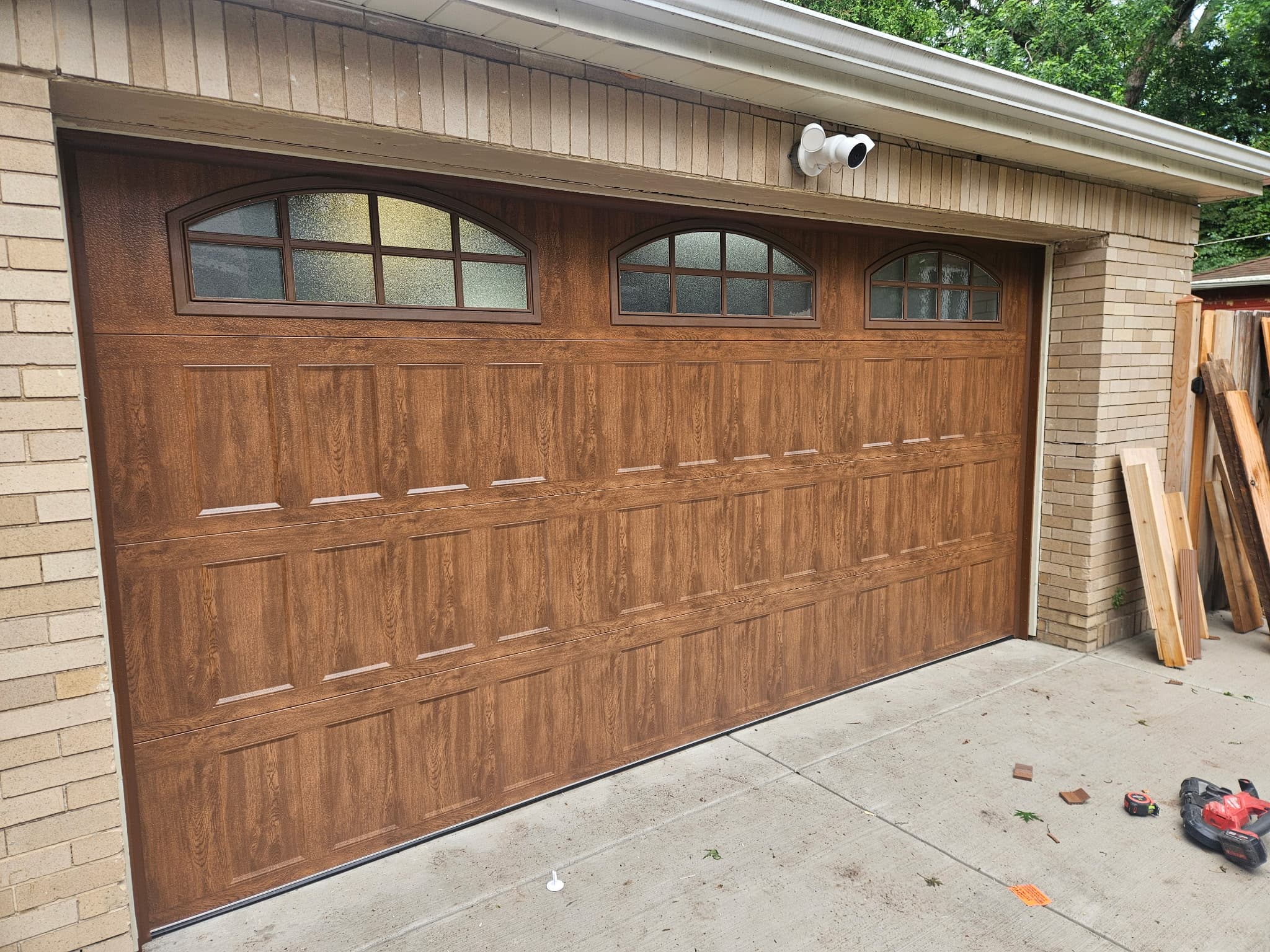 Classic raised-panel replacement. Two-car alley garage, Chicago